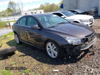 ✅ 2015 Chevrolet Cruze LTZ • VIN: 1G1PG5SB7F7202512 • Lot: 47837793. Listed on Copart with 136,945 mi. Free auction sales archive from the USA and detailed vehicle history report at DreamBid. Image 4.