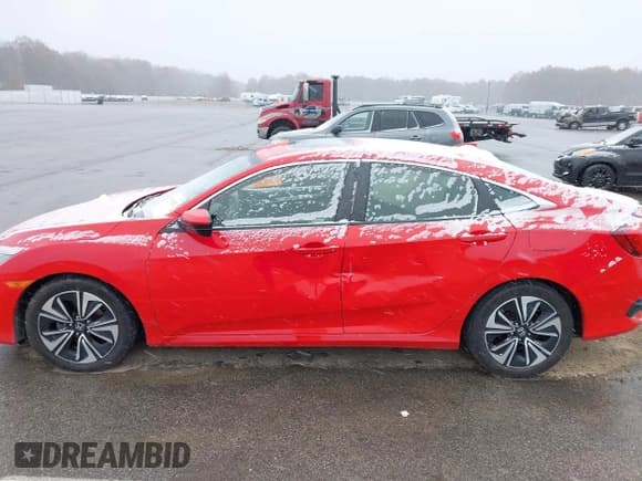 ✅ 2018 Honda Civic EX-T • VIN: JHMFC1F33JX009856 • Lot: 43631342. Listed on IAAI with 139,371 mi. Free auction sales archive from the USA and detailed vehicle history report at DreamBid. Image 15.