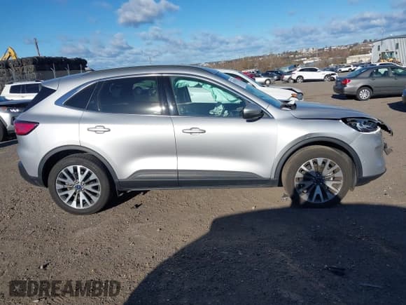 ✅ 2020 Ford Escape Titanium • VIN: 1FMCU9J91LUB17579 • Lot: 43718553. Listed on IAAI with 54,060 mi. Free auction sales archive from the USA and detailed vehicle history report at DreamBid. Image 13.