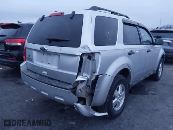 ✅ 2010 Ford Escape XLT • VIN: 1FMCU0D72AKD17806 • Lot: 43708410. Listed on IAAI with 102,965 mi. Free auction sales archive from the USA and detailed vehicle history report at DreamBid. Image 6.