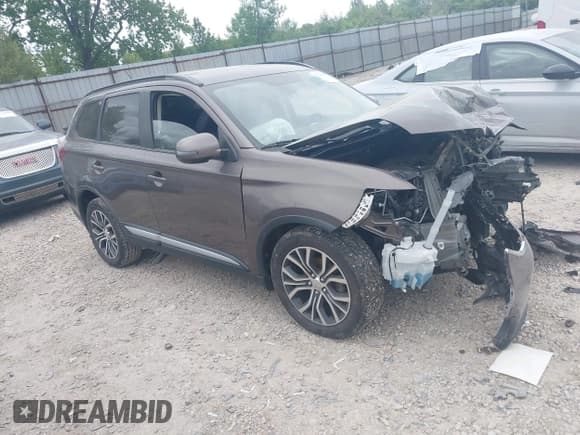 ✅ 2016 Mitsubishi Outlander SE • VIN: JA4AZ3A34GZ017940 • Lot: 42232893. Listed on IAAI with 31,089 mi. Free auction sales archive from the USA and detailed vehicle history report at DreamBid. Image 1.