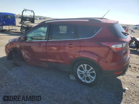 ✅ 2017 Ford Escape SE • VIN: 1FMCU0G91HUC60090 • Lot: 90500725. Listed on Copart with 107,752 mi. Free auction sales archive from the USA and detailed vehicle history report at DreamBid. Image 2.