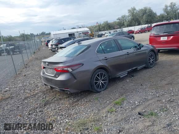 2022 Toyota Camry SE with VIN 4T1G11BK7NU049434, listed as a IAAI auction lot 43099991 with 36,395 mi miles and . Bid and sale history available at DreamBid. Image 4.