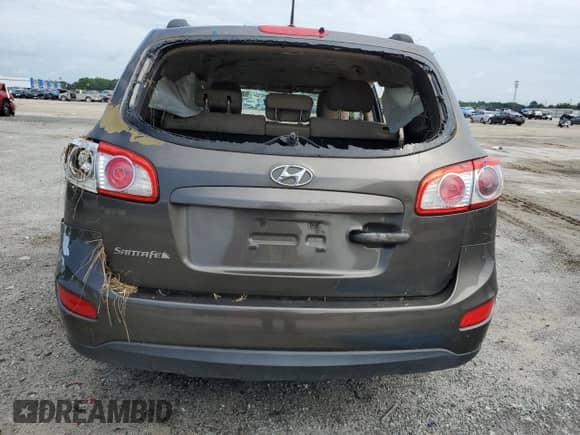 2012 Hyundai Santa Fe GLS с VIN 5XYZG3AB7CG145877, выставлен на аукционе Copart как лот 71986394 с пробегом Не указан миль и На запчасти • Non repairable. История ставок и продаж доступна на DreamBid. Изображение 6.