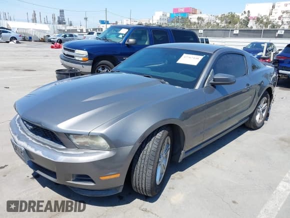 ✅ 2011 Ford Mustang V6 • VIN: 1ZVBP8AM5B5165520 • Lot: 42767448. Listed on IAAI with 212,134 mi. Free auction sales archive from the USA and detailed vehicle history report at DreamBid. Image 2.