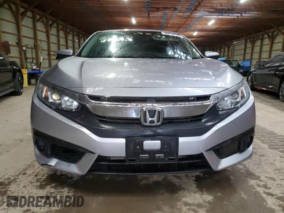 ✅ 2017 Honda Civic EX • VIN: 2HGFC2F8XHH037043 • Lot: 89934795. Wystawiony na Copart z przebiegiem 218 294 mil. Bezpłatny archiwum sprzedaży aukcyjnych z USA i szczegółowy raport historii pojazdu na DreamBid. Zdjęcie 5.
