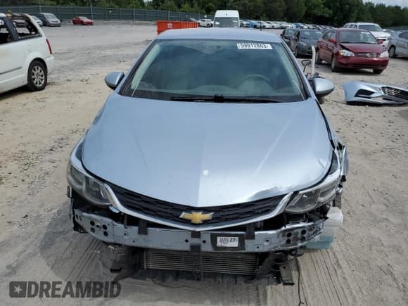 ✅ 2017 Chevrolet Cruze LS • VIN: 1G1BC5SM1H7148926 • Lot: 59912863. Listed on Copart with 116,974 mi. Free auction sales archive from the USA and detailed vehicle history report at DreamBid. Image 5.