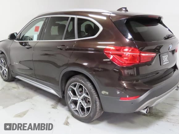 ✅ 2018 BMW X1 sDrive28i • VIN: WBXHU7C37J5L05511 • Лот: 85006215. Опубликован ранее на Copart с пробегом 25 925 миль. Бесплатный доступ к архиву аукционных продаж из США и подробный отчёт об истории автомобиля на DreamBid. Изображение 4.