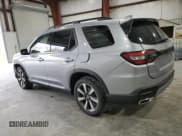 ✅ 2025 Honda Pilot Touring • VIN: 5FNYG1H73SB160805 • Lot: 82770225. Listed on Copart with 1,172 mi. Free auction sales archive from the USA and detailed vehicle history report at DreamBid. Image 2.