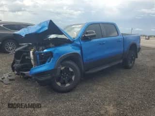 2020 Ram 1500 Rebel z VIN 1C6SRFLT4LN317415, wystawiony jako Copart lot #67455185 z przebiegiem 58 773 mil mil oraz Nie do naprawy • Non repairable. Historia ofert i sprzedaży dostępna na DreamBid. Obrazek 1.