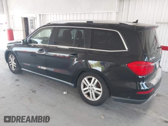 ✅ 2014 Mercedes-Benz GL 450 • VIN: 4JGDF7CE7EA435479 • Лот: 42280243. Опубликован ранее на IAAI с пробегом 138 930 миль. Бесплатный доступ к архиву аукционных продаж из США и подробный отчёт об истории автомобиля на DreamBid. Изображение 3.