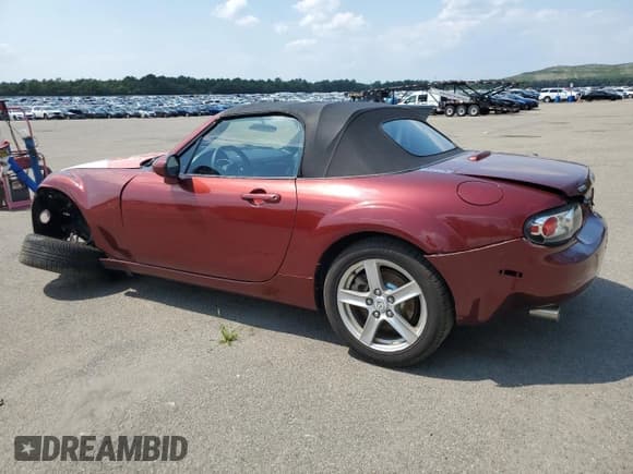 ✅ 2006 Mazda MX-5 Miata Touring • VIN: JM1NC25F960103772 • Lot: 65610385. Wystawiony na Copart z przebiegiem 130 736 mil. Bezpłatny archiwum sprzedaży aukcyjnych z USA i szczegółowy raport historii pojazdu na DreamBid. Zdjęcie 2.