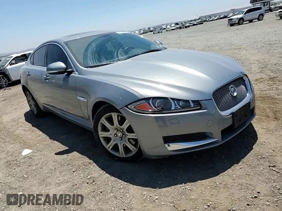 ✅ 2013 Jaguar XF RWD • VIN: SAJWA0E77D8S91277 • Lot: 63109595. Listed on Copart with 81,735 mi. Free auction sales archive from the USA and detailed vehicle history report at DreamBid. Image 14.
