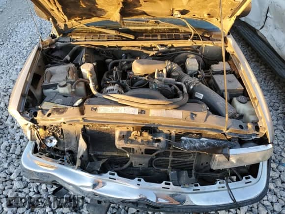 2002 Chevrolet Blazer LS z VIN 1GNDT13WX2K149500, wystawiony jako Copart lot #81766444 z przebiegiem 251 330 mil mil oraz Szkoda całkowita • Salvage title. Historia ofert i sprzedaży dostępna na DreamBid. Obrazek 12.