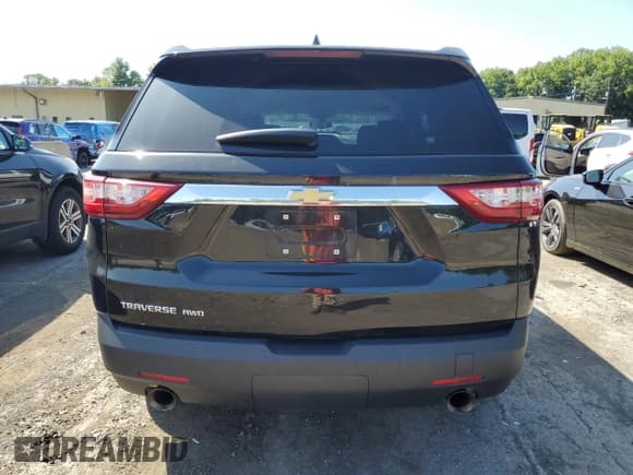 ✅ 2019 Chevrolet Traverse LS • VIN: 1GNEVFKW4KJ184780 • Lot: 68720194. Wystawiony na Copart z przebiegiem 95 565 mil. Bezpłatny archiwum sprzedaży aukcyjnych z USA i szczegółowy raport historii pojazdu na DreamBid. Zdjęcie 6.