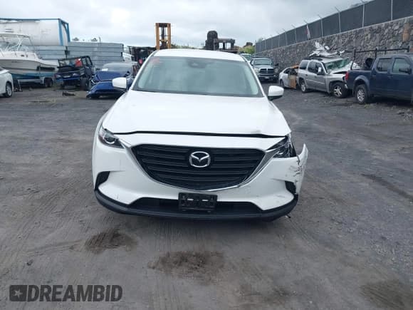 ✅ 2018 Mazda CX-9 Sport • VIN: JM3TCABY8J0203529 • Lot: 42730641. Listed on IAAI with 40,023 mi. Free auction sales archive from the USA and detailed vehicle history report at DreamBid. Image 12.