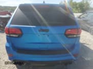 ✅ 2018 Jeep Grand Cherokee • VIN: NCS106058 • Lot: 58186895. Listed on Copart with 94,614 mi. Free auction sales archive from the USA and detailed vehicle history report at DreamBid. Image 6.