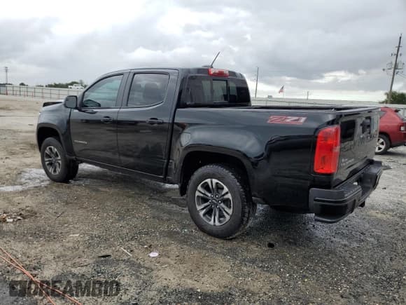 ✅ 2021 Chevrolet Colorado 2WD Z71 • VIN: 1GCGSDEN2M1146579 • Lot: 90245985. Listed on Copart with 94,237 mi. Free auction sales archive from the USA and detailed vehicle history report at DreamBid. Image 2.