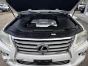 ✅ 2013 Lexus LX 570 • VIN: JTJHY7AXXD4129441 • Lot: 43871439. Listed on IAAI with 111,005 mi. Free auction sales archive from the USA and detailed vehicle history report at DreamBid. Image 10.