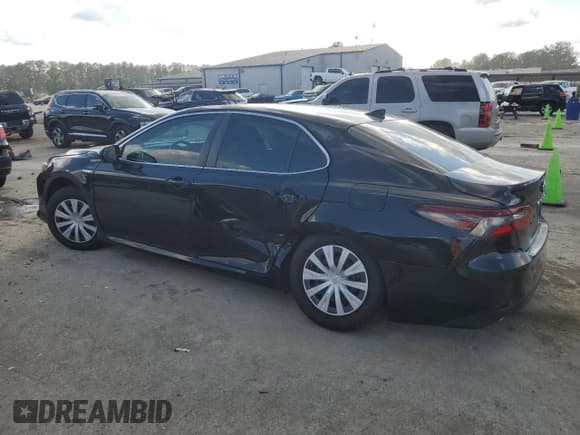 ✅ 2021 Toyota Camry Hybrid LE • VIN: 4T1C31AK0MU562775 • Лот: 92067265. Опубликован ранее на Copart с пробегом 92 294 миль. Бесплатный доступ к архиву аукционных продаж из США и подробный отчёт об истории автомобиля на DreamBid. Изображение 2.