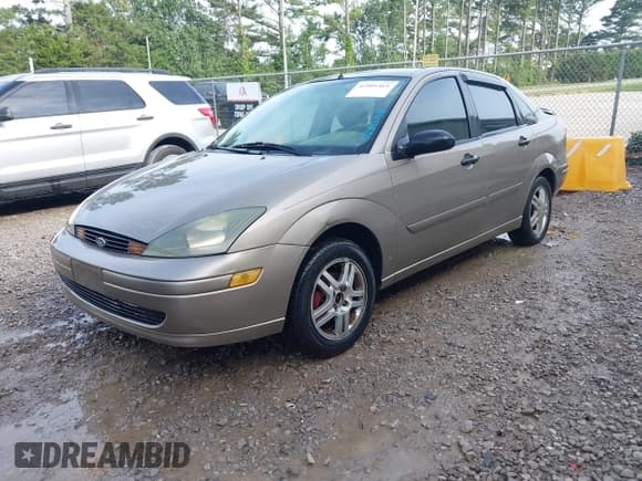 ✅ 2004 Ford Focus SE • VIN: 1FAFP343X4W156745 • Lot: 42501461. Listed on IAAI with 289,925 mi. Free auction sales archive from the USA and detailed vehicle history report at DreamBid. Image 2.