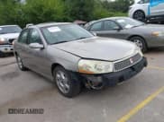 ✅ 2003 Saturn LS • VIN: 1G8JU54F23Y579397 • Lot: 43062943. Listed on IAAI with 184,144 mi. Free auction sales archive from the USA and detailed vehicle history report at DreamBid. Image 1.