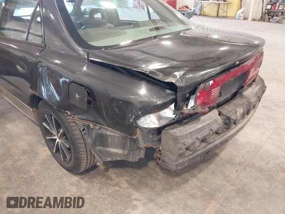 ✅ 2001 Buick Regal GS • VIN: 2G4WF551911130769 • Lot: 41996374. Wystawiony na IAAI z przebiegiem 137 783 mil. Bezpłatny archiwum sprzedaży aukcyjnych z USA i szczegółowy raport historii pojazdu na DreamBid. Zdjęcie 6.