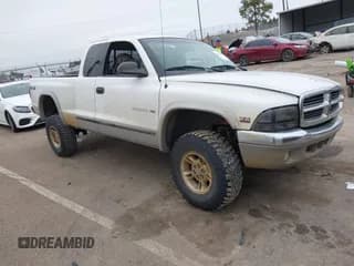✅ 1999 Dodge Dakota SLT • VIN: 1B7GG22X3XS223969 • Lot: 41329085. Wystawiony na IAAI z przebiegiem 185 859 mil. Bezpłatny archiwum sprzedaży aukcyjnych z USA i szczegółowy raport historii pojazdu na DreamBid. Zdjęcie 1.