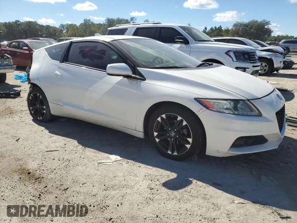 ✅ 2015 Honda CR-Z EX • VIN: JHMZF1D64FS003294 • Lot: 90452195. Listed on Copart with 86,990 mi. Free auction sales archive from the USA and detailed vehicle history report at DreamBid. Image 4.
