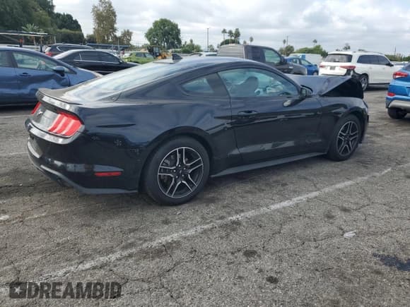✅ 2022 Ford Mustang EcoBoost Premium • VIN: 1FA6P8TH8N5103947 • Lot: 84955565. Listed on Copart with 59,589 mi. Free auction sales archive from the USA and detailed vehicle history report at DreamBid. Image 3.