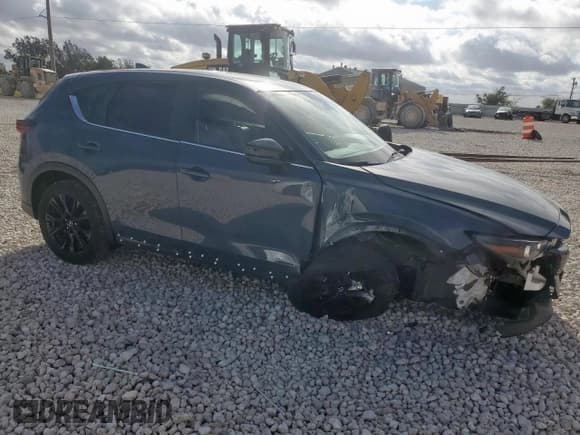 ✅ 2023 Mazda CX-5 S Carbon Edition • VIN: JM3KFBCM9P0167637 • Lot: 91927105. Wystawiony na Copart z przebiegiem 34 774 mil. Bezpłatny archiwum sprzedaży aukcyjnych z USA i szczegółowy raport historii pojazdu na DreamBid. Zdjęcie 4.