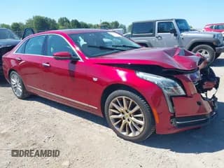 ✅ 2018 Cadillac CT6 AWD • VIN: 1G6KB5RS3JU116763 • Lot: 43053586. Listed on IAAI with 117,724 mi. Free auction sales archive from the USA and detailed vehicle history report at DreamBid. Image 1.