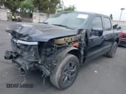 ✅ 2023 Ford F-150 Lightning Pro • VIN: 1FTVW1EV6PWG28652 • Лот: 42338698. Опубликован ранее на IAAI с пробегом 25 097 миль. Бесплатный доступ к архиву аукционных продаж из США и подробный отчёт об истории автомобиля на DreamBid. Изображение 2.