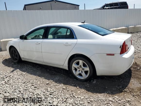 ✅ 2010 Chevrolet Malibu 1LS • VIN: 1G1ZB5EB5AF291983 • Lot: 57742794. Listed on Copart with 115,157 mi. Free auction sales archive from the USA and detailed vehicle history report at DreamBid. Image 2.