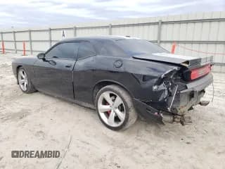 ✅ 2012 Dodge Challenger SRT-8 392 • VIN: 2C3CDYCJ9CH176411 • Lot: 42472935. Wystawiony na Copart z przebiegiem 83 919 mil. Bezpłatny archiwum sprzedaży aukcyjnych z USA i szczegółowy raport historii pojazdu na DreamBid. Zdjęcie 2.