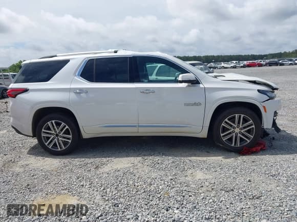✅ 2023 Chevrolet Traverse High Country • VIN: 1GNEVNKW7PJ108505 • Lot: 42315127. Wystawiony na IAAI z przebiegiem 79 674 mil. Bezpłatny archiwum sprzedaży aukcyjnych z USA i szczegółowy raport historii pojazdu na DreamBid. Zdjęcie 13.