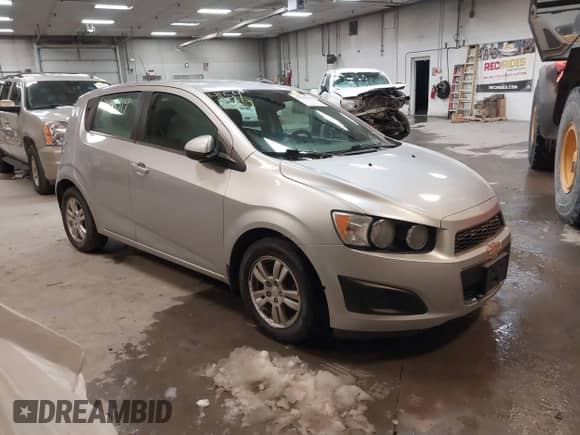 2013 Chevrolet Sonic LT with VIN 1G1JD6SH7D4203621, listed as a IAAI auction lot 41546319 with 201,164 mi miles and . Bid and sale history available at DreamBid. Image 1.