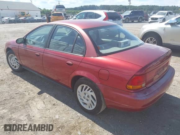 1998 Saturn SL z VIN 1G8ZK5277WZ156690, wystawiony jako IAAI lot #43106078 z przebiegiem 168 196 mil mil oraz . Historia ofert i sprzedaży dostępna na DreamBid. Obrazek 3.