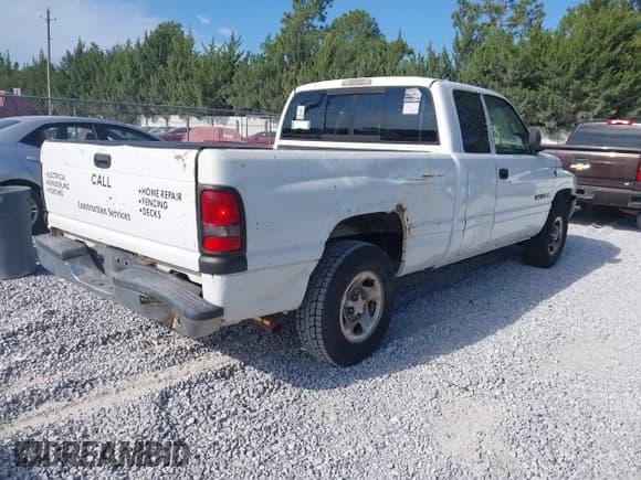 ✅ 2001 Dodge 1500 • VIN: 3B7HC13Y11G756418 • Lot: 43155987. Listed on IAAI with 182,064 mi. Free auction sales archive from the USA and detailed vehicle history report at DreamBid. Image 4.