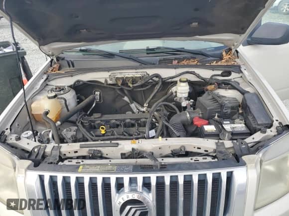 2009 Mercury Mariner with VIN 4M2CU81759KJ04555, listed as a Copart auction lot 85778504 with 130,514 mi miles and Salvage title. Bid and sale history available at DreamBid. Image 12.