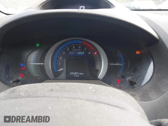 ✅ 2011 Honda Insight EX • VIN: JHMZE2H75BS012429 • Lot: 43714420. Listed on IAAI with 126,391 mi. Free auction sales archive from the USA and detailed vehicle history report at DreamBid. Image 7.