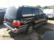 ✅ 2001 Toyota Land Cruiser • VIN: JTEHT05J512016563 • Lot: 41868193. Listed on IAAI with 247,653 mi. Free auction sales archive from the USA and detailed vehicle history report at DreamBid. Image 4.