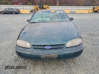 ✅ 1999 Chevrolet Lumina • VIN: 2G1WL52M0X9205910 • Lot: 94118345. Listed on Copart with 143,165 mi. Free auction sales archive from the USA and detailed vehicle history report at DreamBid. Image 5.