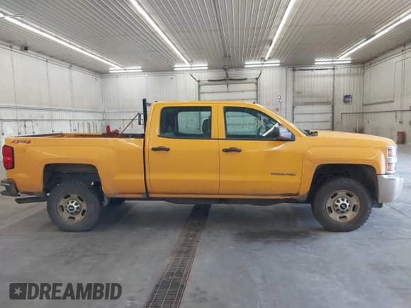 ✅ 2018 Chevrolet Silverado 2500HD Work Truck • VIN: 1GC1KUEG0JF173852 • Lot: 42516951. Listed on IAAI with 56,095 mi. Free auction sales archive from the USA and detailed vehicle history report at DreamBid. Image 14.