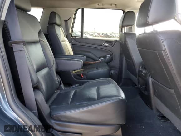 2019 Chevrolet Tahoe Premier z VIN 1GNSKCKJ9KR200083, wystawiony jako Copart lot #57910955 z przebiegiem 53 126 mil mil oraz Szkoda całkowita • Salvage title. Historia ofert i sprzedaży dostępna na DreamBid. Obrazek 11.