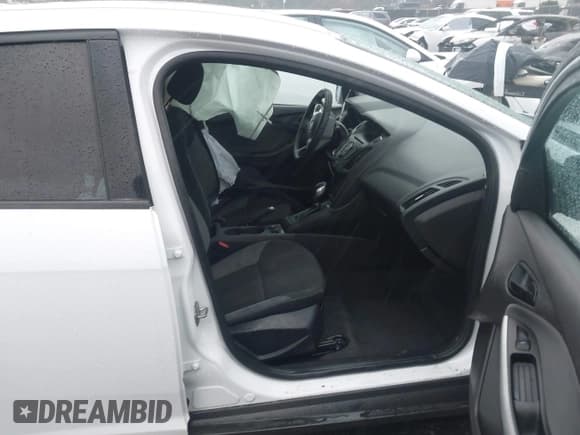 ✅ 2014 Ford Focus S • VIN: 1FADP3E20EL198440 • Lot: 43704241. Listed on IAAI with 78,827 mi. Free auction sales archive from the USA and detailed vehicle history report at DreamBid. Image 5.