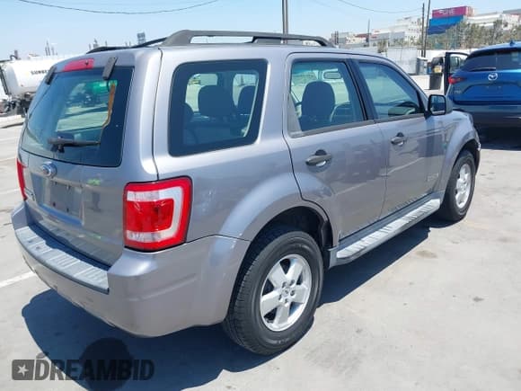 ✅ 2008 Ford Escape XLS • VIN: 1FMCU02Z68KE49322 • Lot: 42818502. Listed on IAAI with 154,099 mi. Free auction sales archive from the USA and detailed vehicle history report at DreamBid. Image 4.