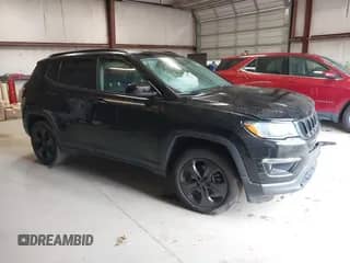 2021 Jeep Compass Latitude with VIN 3C4NJDBB9MT552064, listed as a IAAI auction lot 42345320 with 57,080 mi miles and . Bid and sale history available at DreamBid. Image 1.