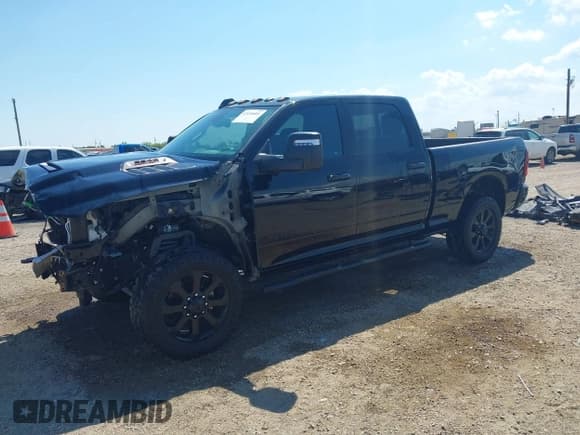 ✅ 2024 Ram 2500 Laramie • VIN: 3C6UR5FL3RG345853 • Lot: 43116601. Listed on IAAI with 28,902 mi. Free auction sales archive from the USA and detailed vehicle history report at DreamBid. Image 2.