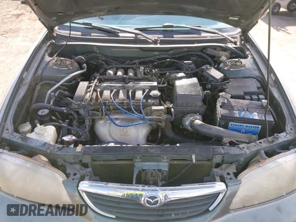 ✅ 1998 Mazda 626 DX • VIN: 1YVGF22C2W5691764 • Lot: 43677590. Wystawiony na IAAI z przebiegiem 142 191 mil. Bezpłatny archiwum sprzedaży aukcyjnych z USA i szczegółowy raport historii pojazdu na DreamBid. Zdjęcie 10.